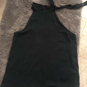 Black halter top. With strings on the neck. NW